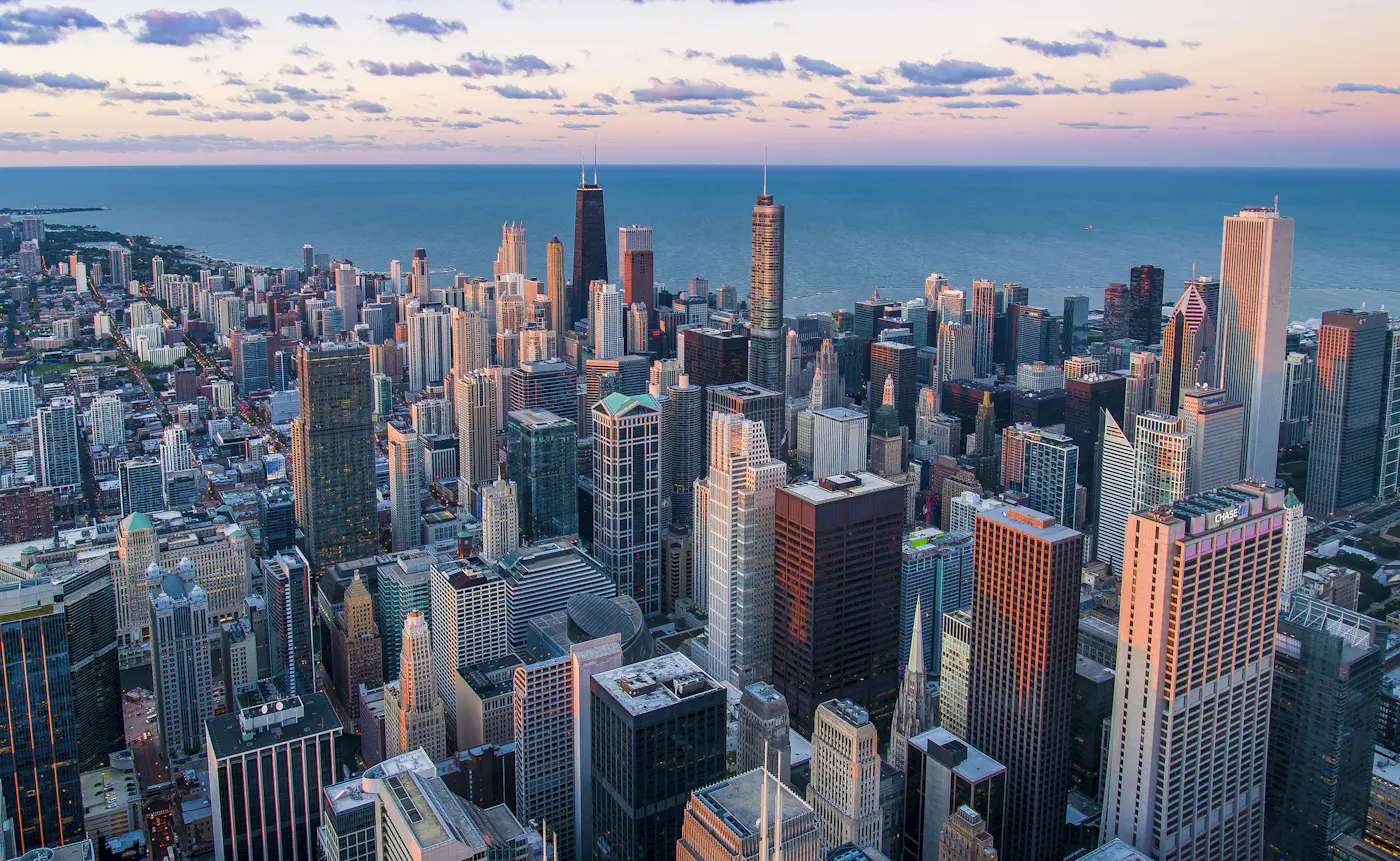 A U.S. city skyline at dusk — the market founders abroad are building toward